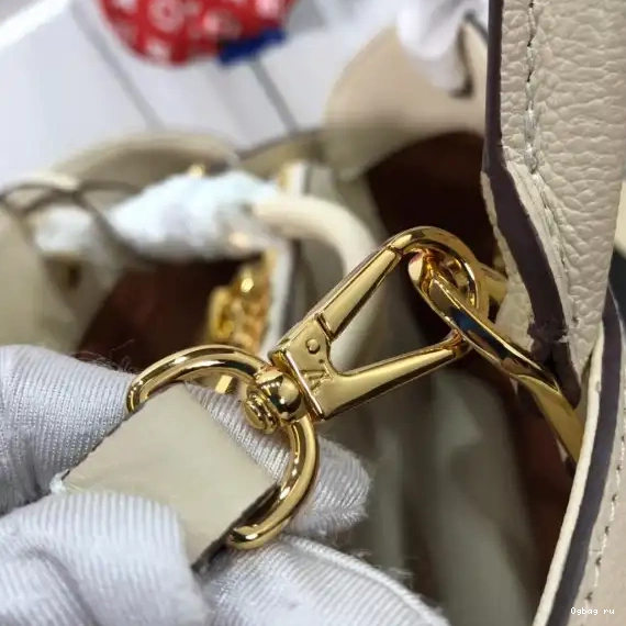 MM MONTAIGNE LOUIS VUITTON 0624